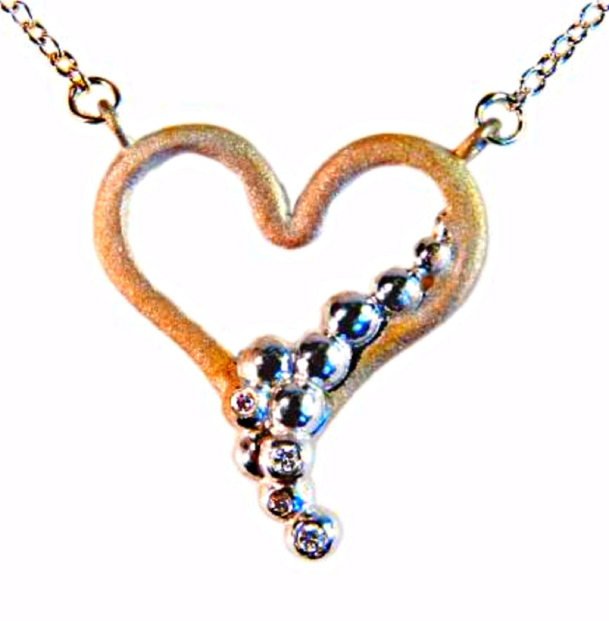 Heart Flow Necklace with Overflowing Diamonds  in 18K Gold