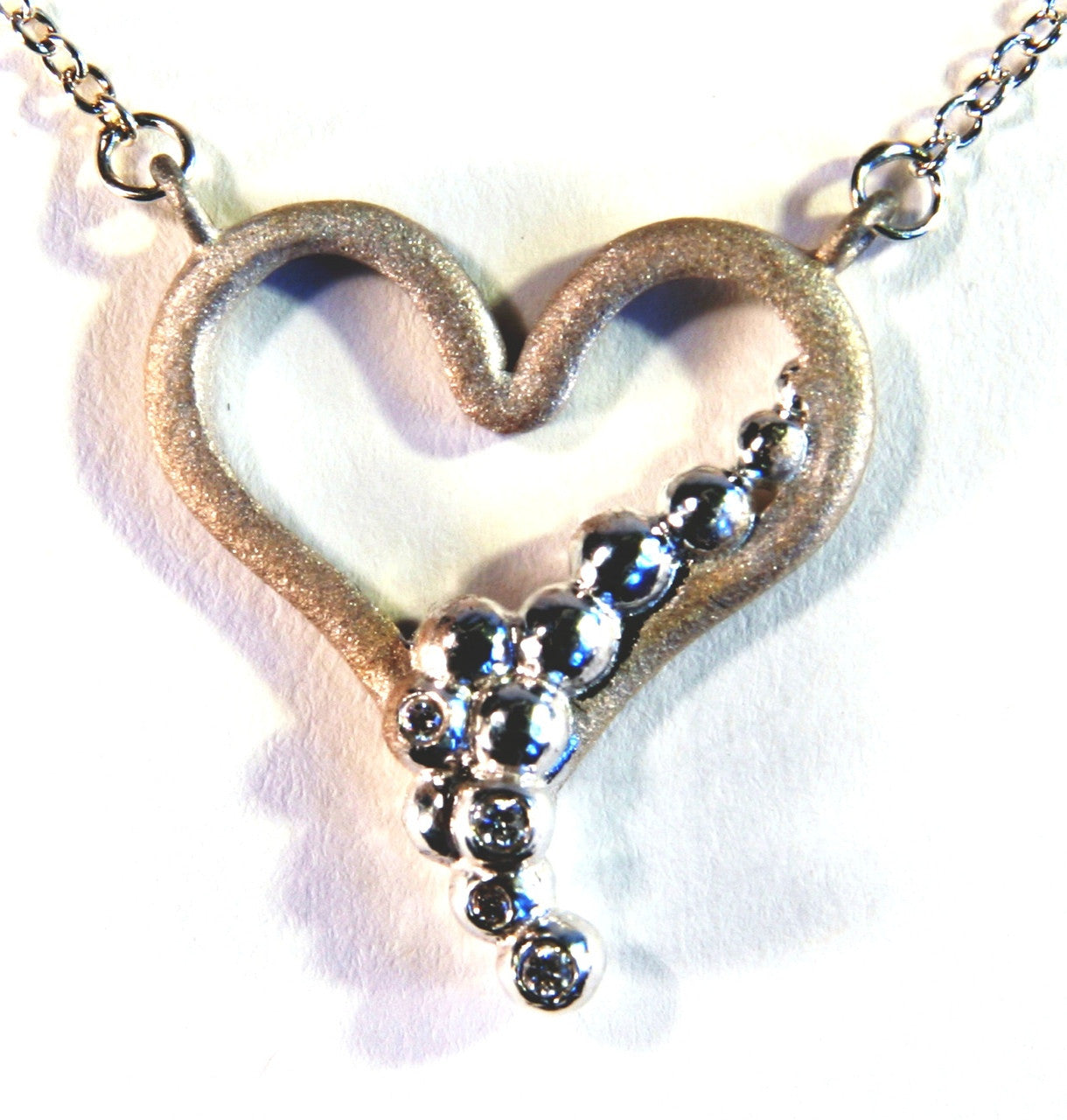 Heart Flow Necklace with Overflowing Diamonds  in 18K Gold