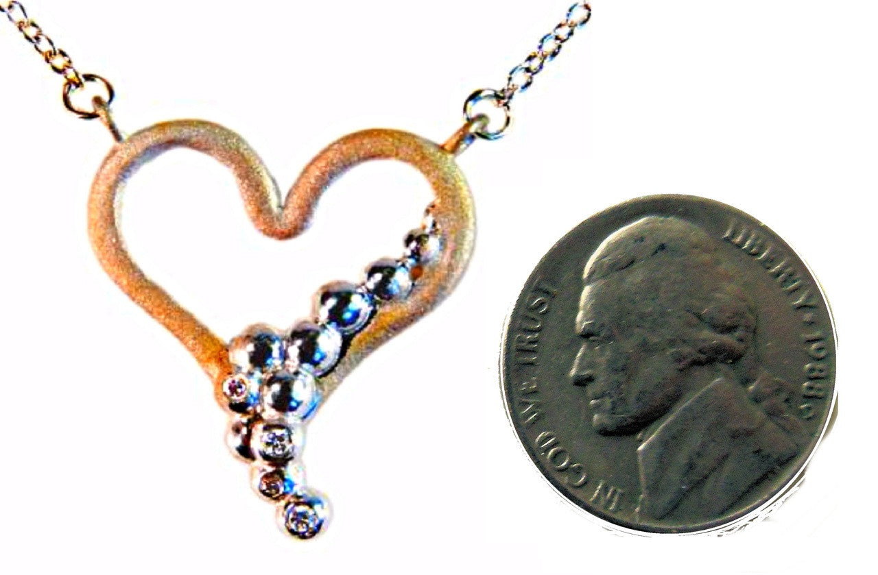 Heart Flow Necklace with Overflowing Diamonds  in 18K Gold