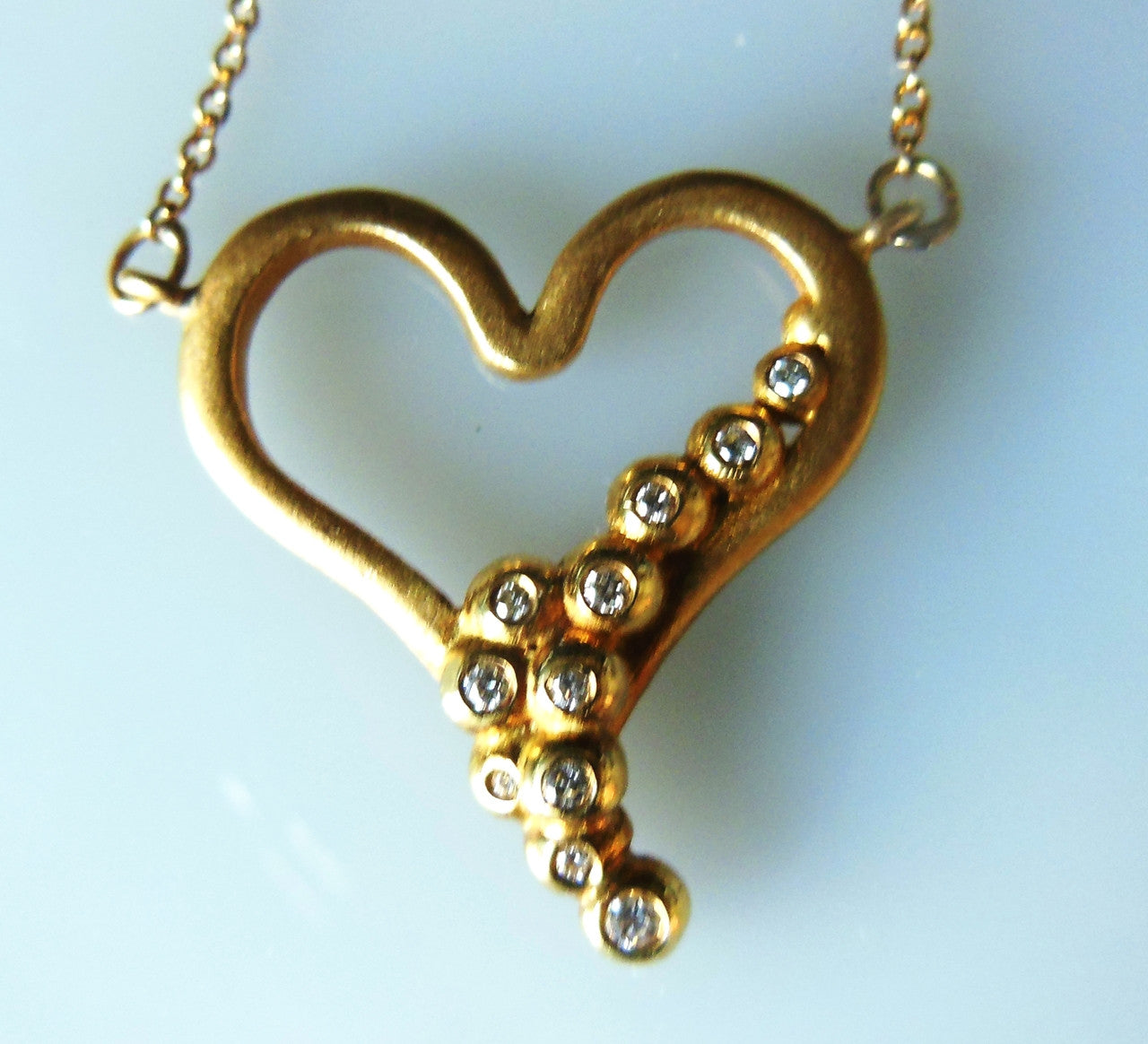 Heart Flow Necklace with Overflowing Diamonds  in 18K Gold